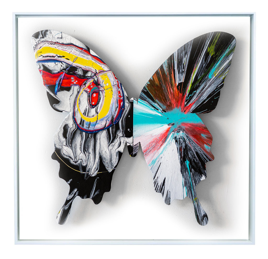 With the butterfly as their canvas, Callen Schaub (left wing) and PunkMeTender (right wing) use a bold palette  for Aleteo (34”×34, 5 of 7 in the 2026 Asymmetry Series). Defying expected symmetry, each abstract artist contributes their signature style. 